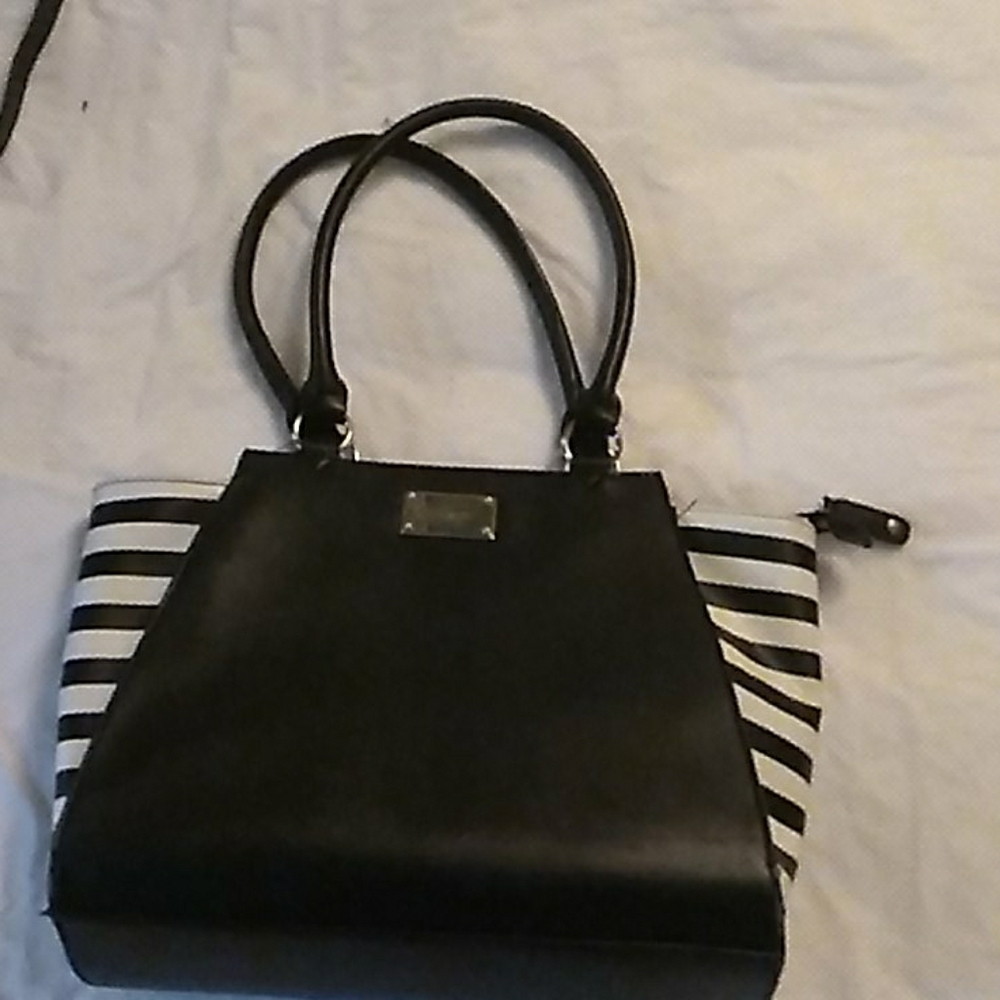 Almost brand new nine west black strips purse
